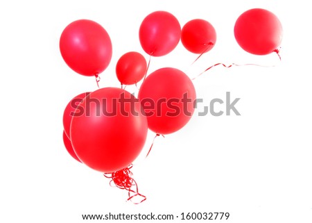 Red balloons with ribbons isolated on a white background. Royalty-Free Stock Photo #160032779