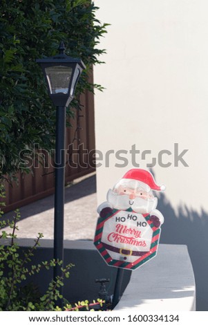 santa claus card with the phrase ho ho ho merry christmas