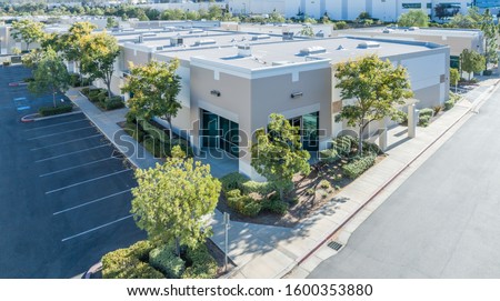 Aerial View Of Industrial Commerce Office Buildings. Royalty-Free Stock Photo #1600353880