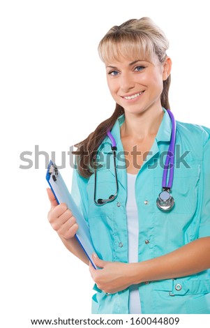a friendly female doctor holding folder and smiling