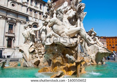 Fountain of the four Rivers with Egyptian obelisk on Piazza Navona in Rome. Italy.