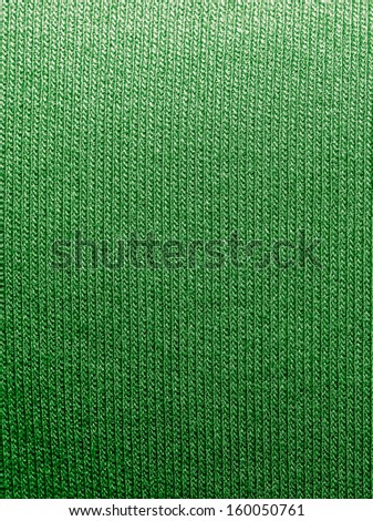 background of a green knitted fabric