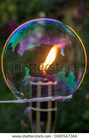 Soap bubble with a flame inside