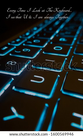 Laptop keyboard images in dark background LOVE QUOTES 