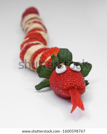 little banana and strawberries snake funny kids food healthy