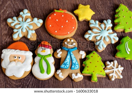 Christmas Gingerbread Man Cookies on a Wooden Background .Christmas Food