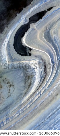 collision of galaxies, vertical abstract photography of the deserts of Africa from the air, aerial view of desert landscapes, Genre: Abstract Naturalism, from the abstract to the figurative, 