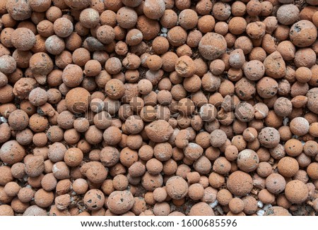 fired clay hydro pellets for growing hydroponics plants, growing media Royalty-Free Stock Photo #1600685596