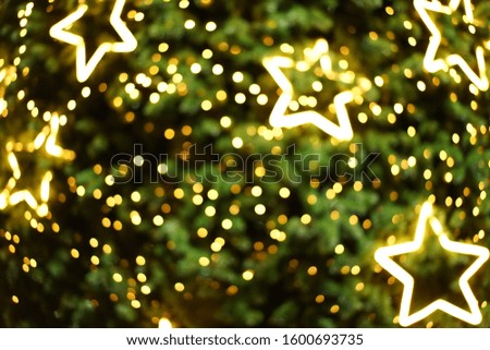 bokeh light stars on christmas tree background