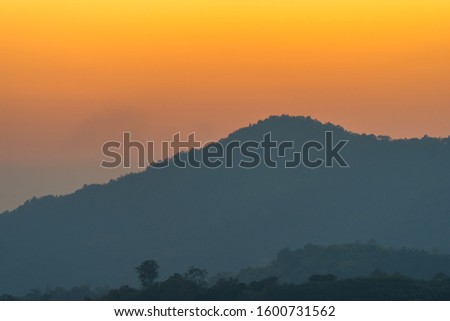 golden sunrise above the mountain range on Khun Sathan Nation Park