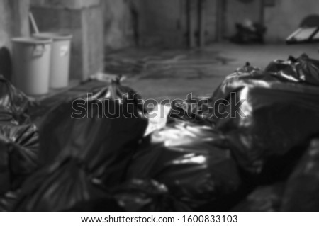 Garbage bags and trash that are very blurred