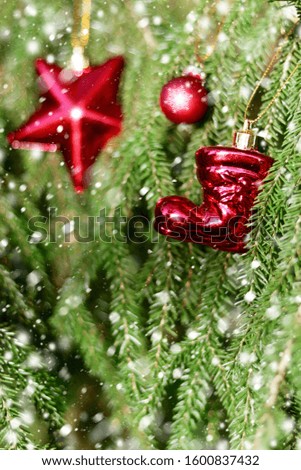 Christmas decor on fir branches. Close-up. A Christmas background with a place for the text.