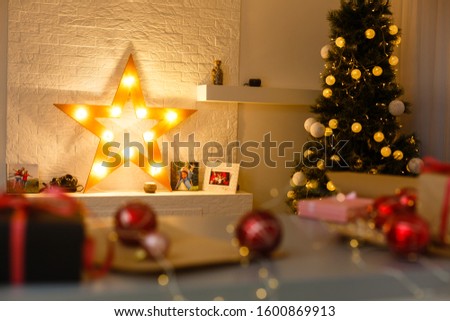 Christmas tree lights reflecting from glass balls and mirror