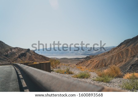 Lonely road in the death valley in USA