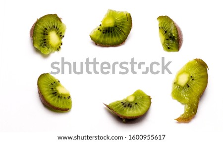 frame of kiwi fruit isolated on white background