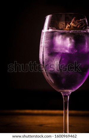 alcoholic beverage cocktail prepared in a glass with ice
