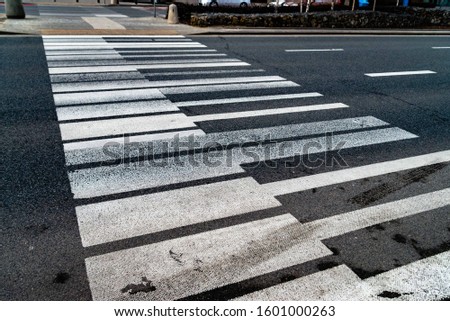 Crosswalk in the form of piano keys. Abstract musical background. Piano shaped lines. an interesting way of embellishing roads and getting people to be careful.
