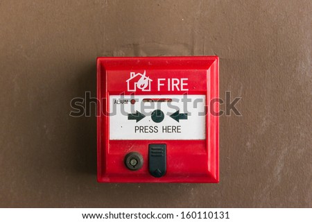 fire alarm switch on the wall