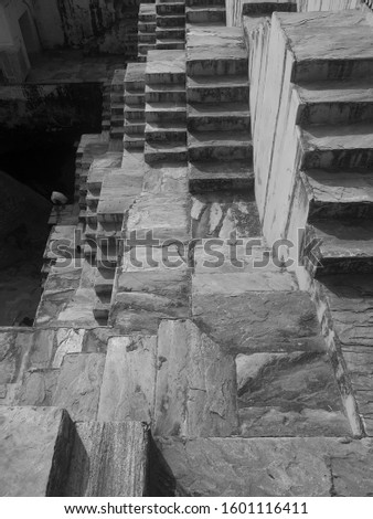 Detail of steps at Panna Meena ka Kund, the historic step well & rainwater catchment known for its picturesque symmetrical stairways. Located at Amer district Jaipur, Rajasthan