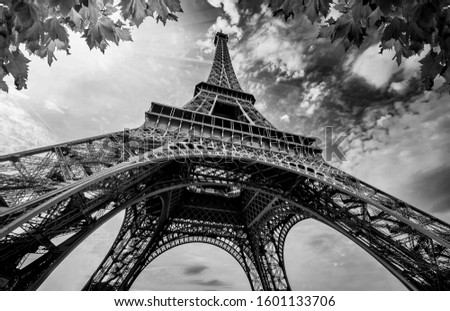 Eiffel Tower in Paris France. Eifel Tower with Golden Light Rays and Beautiful Architecture. Black and White Photography