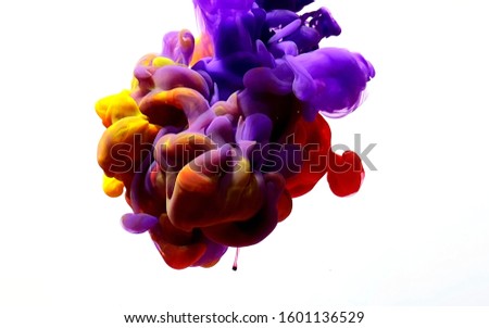 Colorful abstract background. Stylish modern background. Watercolor ink in water. Powerful explosion of paints on a white background. Cool trending screensaver.