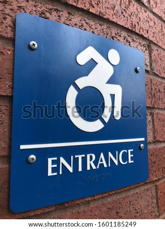 Progressive Handicapped Person Sign Depicting Person I’m wheelchair moving quickly — ADA compliant sign and health sign