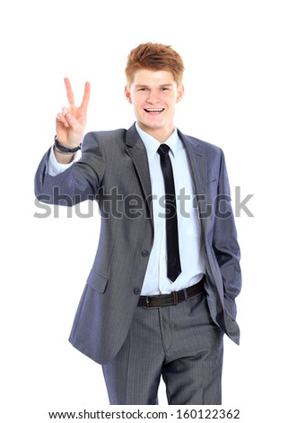 The young handsome businessman isolated on a white background.