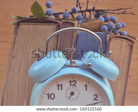 Vintage clock and books