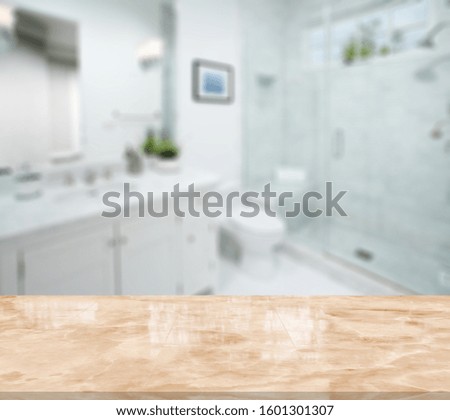 Empty marble top table with blurred bathroom interior Background. for product display montage.