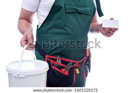 Painter with bucket showing his visit card isolated on white