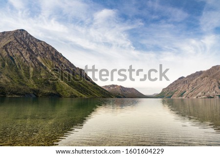 Reflection of mountains on Kathleen Lake in Kluane National Park in the Yukon Territory, Canada