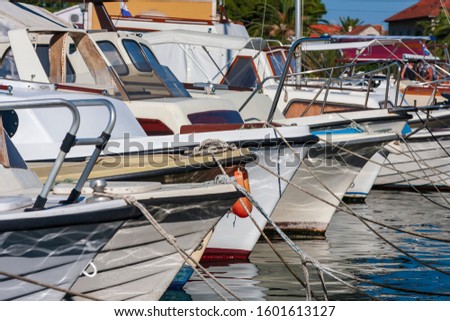 Boats and landscape in the historic port town of Stari Grad on the island of Hvar in Croatia.
