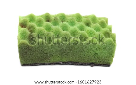 Green dirty, used cleaning sponge isolated on white background