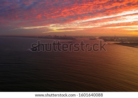 The Netherlands holland. Ijmuiden pier dyke with sunrise. dutch port entrance