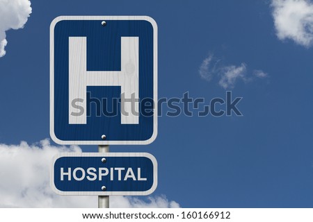 An American blue road sign with sky background with a capital H and word Hospital, Hospital Sign