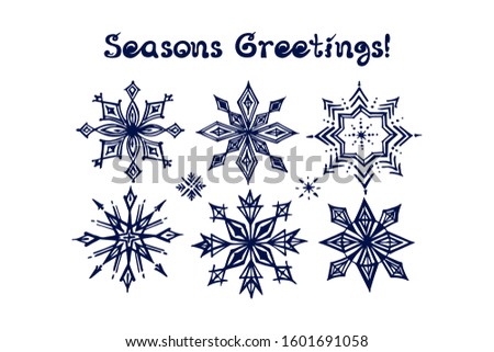 Hand drawn winter set with snowflakes and handwritten text. Inscription - Seasons Greetings