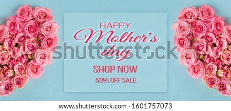 Mother's day sale discount background.Women's day greeting card.Beautiful composition with a heart of pink roses on a blue background.Greeting card to my mother