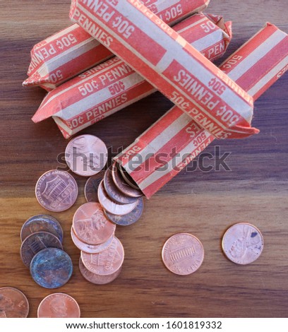 Loose pennies and rolled pennies