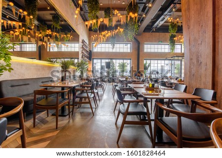 Interior of a modern urban restaurant Royalty-Free Stock Photo #1601828464