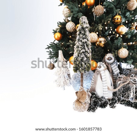 Penguin dolls and white Christmas trees