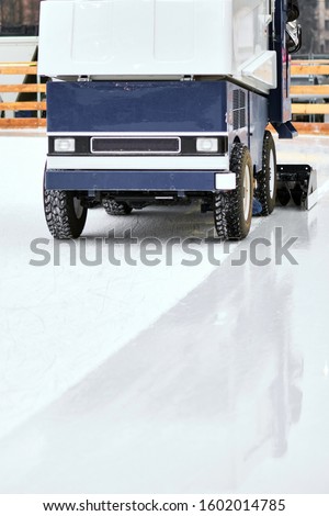 Ice resurfacing machine ,Ice resurfacer, resurfacing the ice rink in the central park of the town