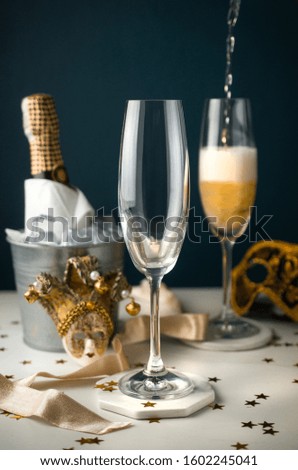 Pouring New Year champagne, 2020 background