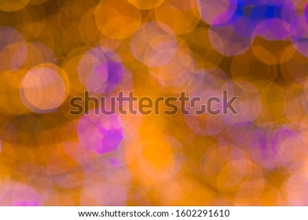 Abstract circular bokeh background of Christmaslight. Fresh healthy green bio background with abstract blurred foliage and bright summer sunlight and a central copyspace for your text or advertisment
