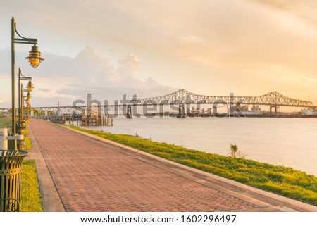 Walking path along the Mississippi River in Baton Rouge, Louisiana Royalty-Free Stock Photo #1602296497