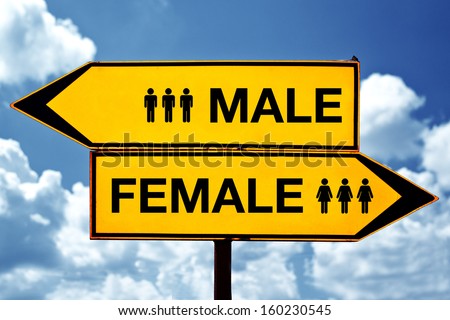 male versus female, opposite direction signs on the street