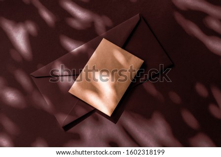 Holiday marketing, business kit and email newsletter concept - Beauty brand identity as flatlay mockup design, business card and letter for online luxury branding on chocolate shadow background