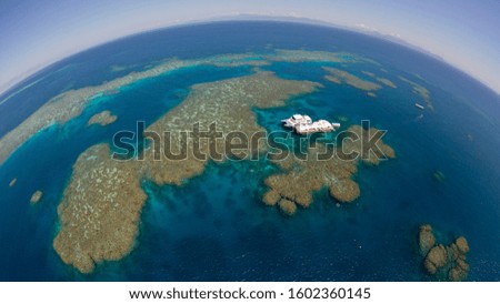 Beautiful Coral Reefs at nearby Cairns shot from Helicopter