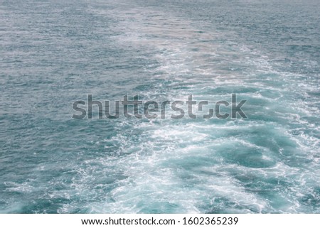 ship waves at tranquil  sea