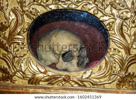 Reliquary containing a Catholic relic in the form of a woman's skull. This is the physical remains of St. Martianne, a saint local to Albi. Albi Cathedral, France, Tarn department of Occitanie Royalty-Free Stock Photo #1602451369