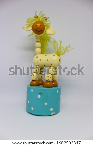 An old fassion simple children's wooden toy giraffe 